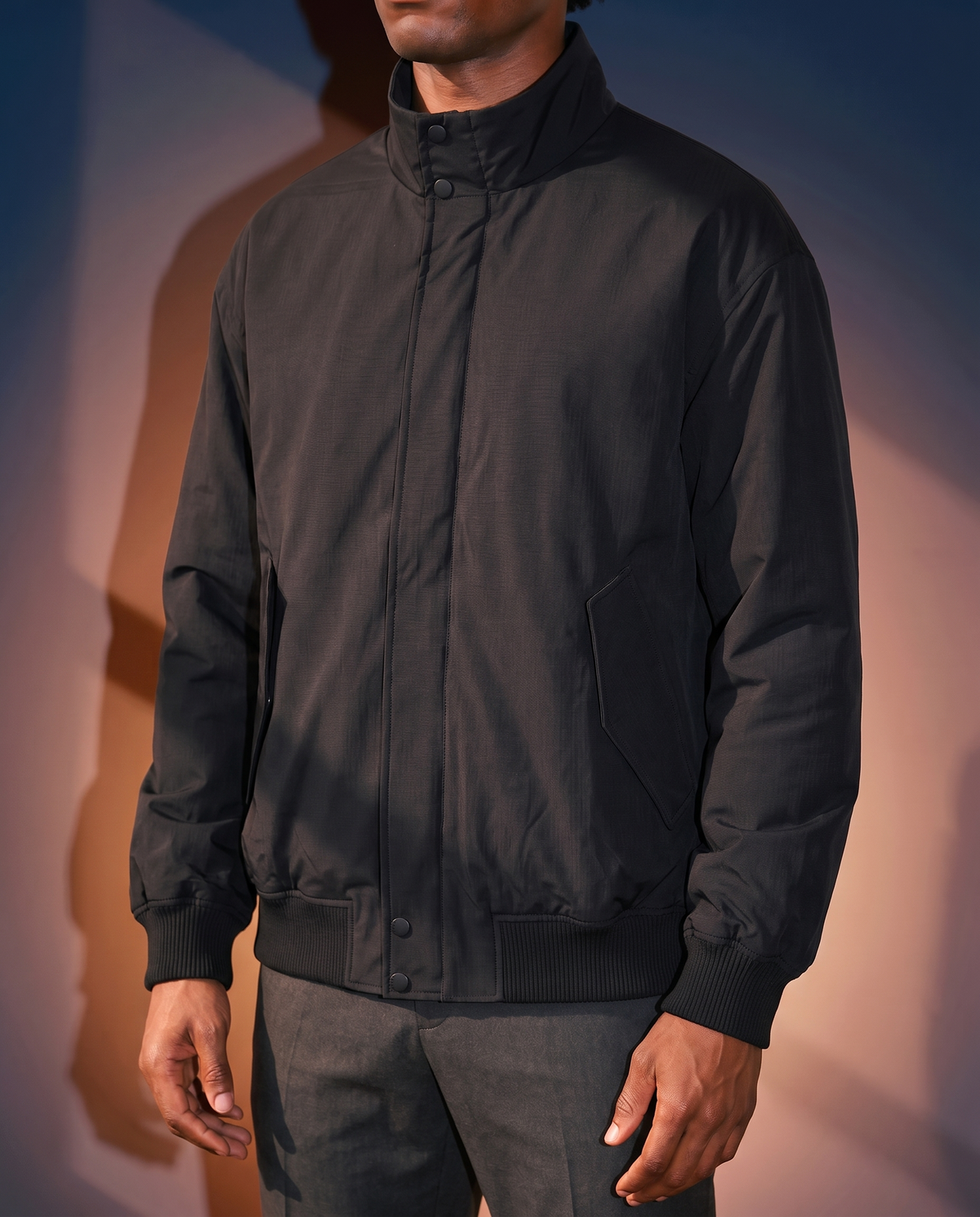 Men's Padded Stand-Collar Jacket in Black on model, affordable men's jacket