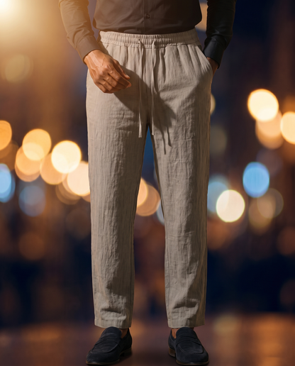 Men's Linen Drawstring Trousers in gray on model, going out pants