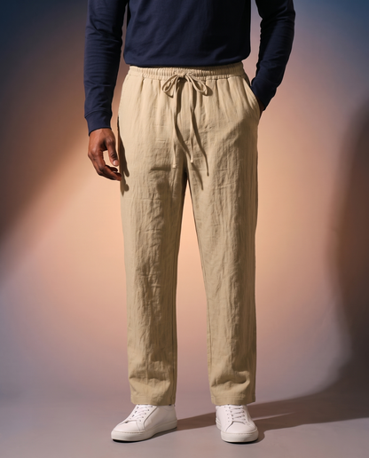 Men's Linen Drawstring Trousers in khaki on model, going out pants