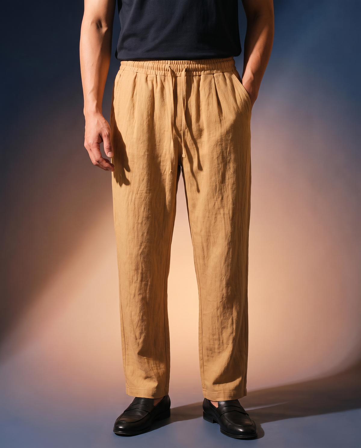 Men's Linen Drawstring Trousers in Earthy yellow on model, going out pants