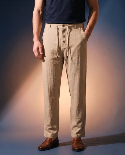 Men's Button-Detail Linen Pants in Khaki on model, going out pants