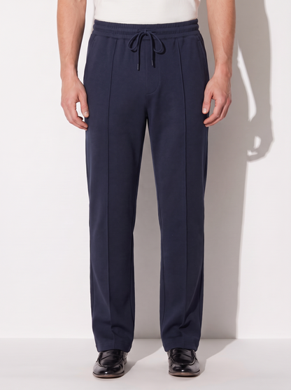 Men's Knit Straight-Leg Trousers in Navy blue on model, going out pants