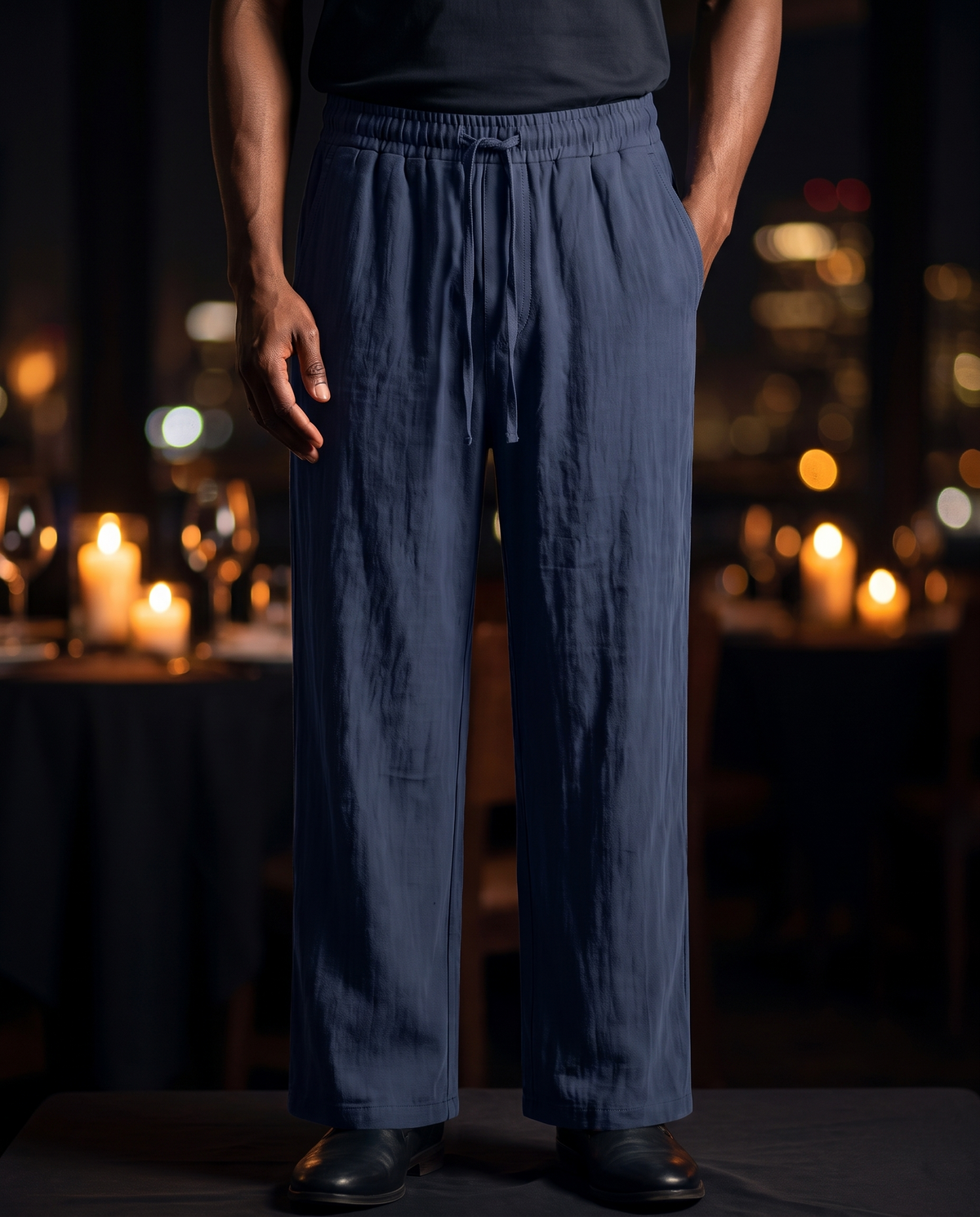 Men's Linen Drawstring Trousers in navy blue on model, going out pants
