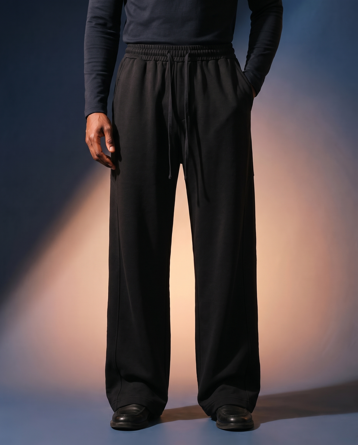 Men's Draped Wide-Leg Trousers in Black on model, going out pants